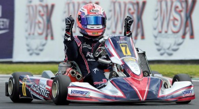 Basz K. celebrating on his Kosmic kart