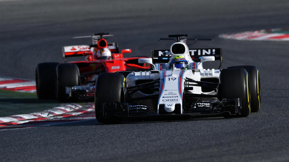 Williams Massa infront of the Ferrari in testing at Barcelona